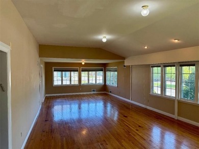 This expansive 7-bedroom, 4-bathroom home offers the perfect - photo 5