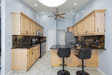 Move-in ready 3/2 pool home with no HOA in Port St. Lucie! This - photo 12