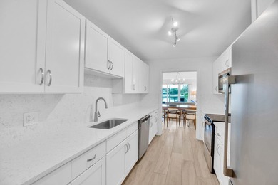 From the moment that you walk into this fully remodeled and - photo 2