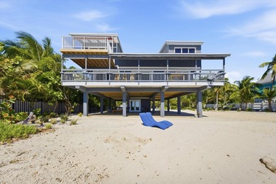 Stunning oceanfront home. This 4-bedroom, 3-bathroom home is a - photo 16
