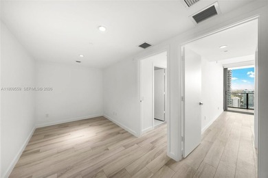 Welcome to One Paraiso 3104. Private elevator access opens up to