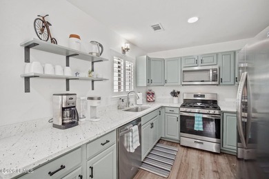 Located in Pigeon Point, this thoughtfully renovated 3-bedroom - photo 7