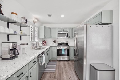 Located in Pigeon Point, this thoughtfully renovated 3-bedroom - photo 8