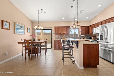 Beautiful desert lake home offering 3 bedrooms, 2 baths, and a - photo 11