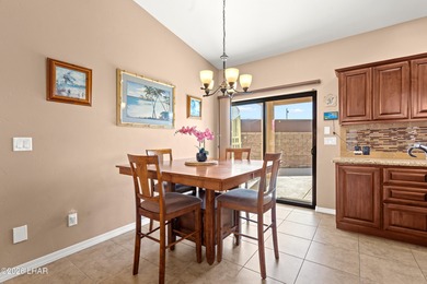 Beautiful desert lake home offering 3 bedrooms, 2 baths, and a - photo 12