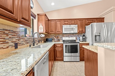 Beautiful desert lake home offering 3 bedrooms, 2 baths, and a - photo 13
