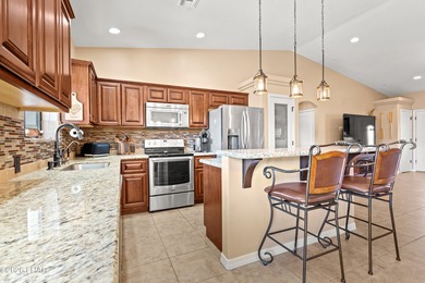 Beautiful desert lake home offering 3 bedrooms, 2 baths, and a - photo 14