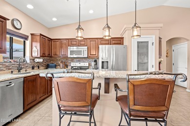 Beautiful desert lake home offering 3 bedrooms, 2 baths, and a - photo 15