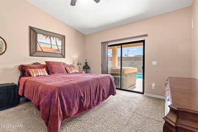 Beautiful desert lake home offering 3 bedrooms, 2 baths, and a - photo 17