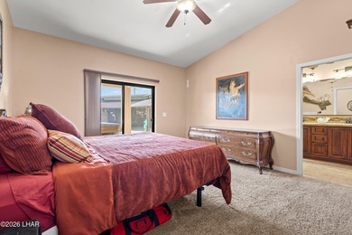 Beautiful desert lake home offering 3 bedrooms, 2 baths, and a - photo 18