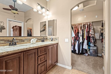 Beautiful desert lake home offering 3 bedrooms, 2 baths, and a - photo 19
