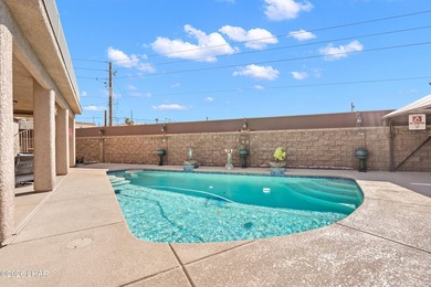 Beautiful desert lake home offering 3 bedrooms, 2 baths, and a - photo 28