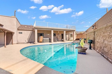 Beautiful desert lake home offering 3 bedrooms, 2 baths, and a - photo 29