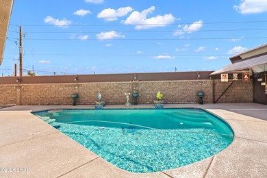 Beautiful desert lake home offering 3 bedrooms, 2 baths, and a - photo 30