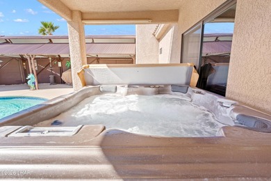 Beautiful desert lake home offering 3 bedrooms, 2 baths, and a - photo 31