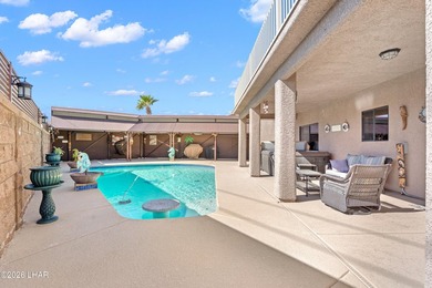Beautiful desert lake home offering 3 bedrooms, 2 baths, and a - photo 34