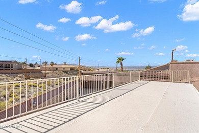 Beautiful desert lake home offering 3 bedrooms, 2 baths, and a - photo 35