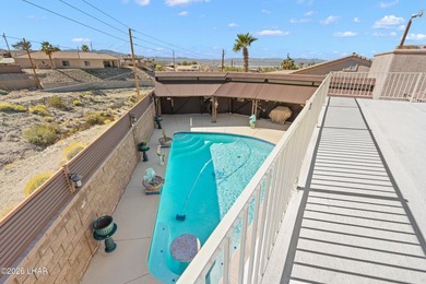 Beautiful desert lake home offering 3 bedrooms, 2 baths, and a - photo 37