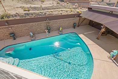 Beautiful desert lake home offering 3 bedrooms, 2 baths, and a - photo 38