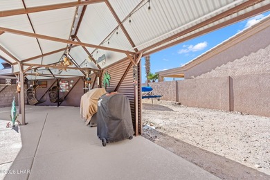 Beautiful desert lake home offering 3 bedrooms, 2 baths, and a - photo 42