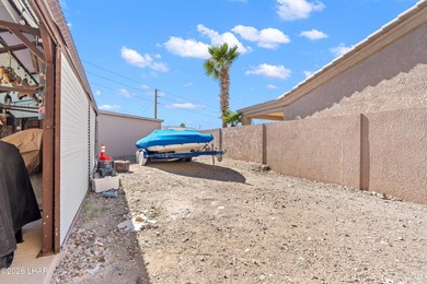 Beautiful desert lake home offering 3 bedrooms, 2 baths, and a - photo 43