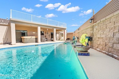 Beautiful desert lake home offering 3 bedrooms, 2 baths, and a - photo 45