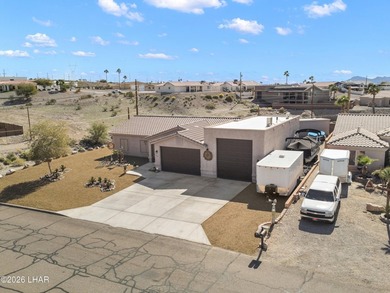 Beautiful desert lake home offering 3 bedrooms, 2 baths, and a - photo 46