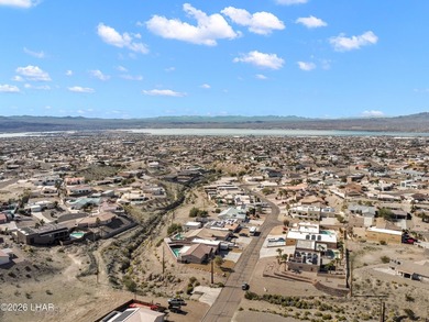 Beautiful desert lake home offering 3 bedrooms, 2 baths, and a - photo 49