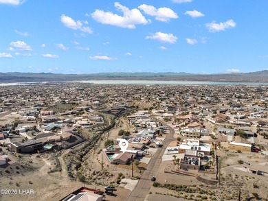 Beautiful desert lake home offering 3 bedrooms, 2 baths, and a - photo 50