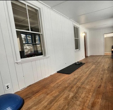 Step into this cozy 2-bedroom, 1.5-bath New Englander, where - photo 11