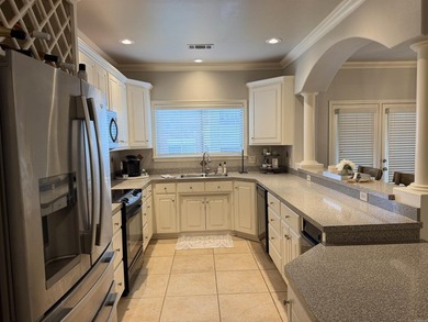 Enjoy easy, ground-level living in this beautifully maintained - photo 12