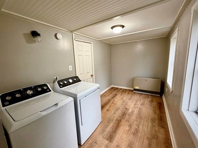 Step into this cozy 2-bedroom, 1.5-bath New Englander, where - photo 12