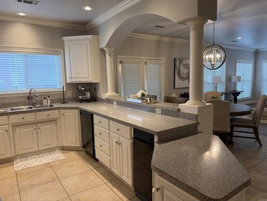 Enjoy easy, ground-level living in this beautifully maintained - photo 13