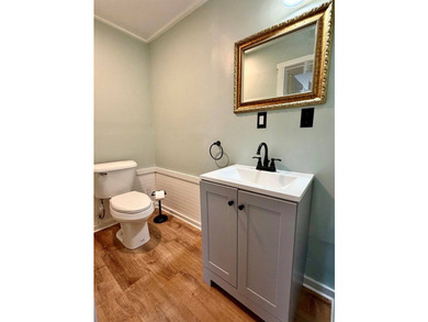 Step into this cozy 2-bedroom, 1.5-bath New Englander, where - photo 13