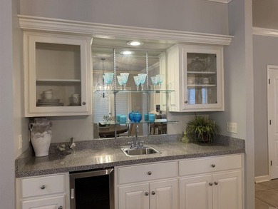Enjoy easy, ground-level living in this beautifully maintained - photo 17
