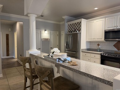 Enjoy easy, ground-level living in this beautifully maintained - photo 23