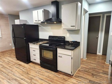 Completely remodeled in 2021 and move-in ready! This beautifully - photo 3