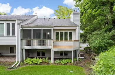 This sophisticated Glen Lake townhome is nestled in a quiet - photo 1