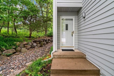 This sophisticated Glen Lake townhome is nestled in a quiet - photo 2