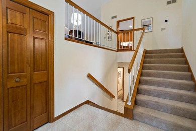 This sophisticated Glen Lake townhome is nestled in a quiet - photo 3
