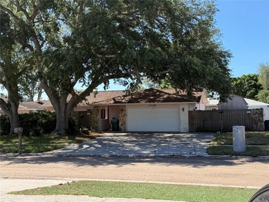 Welcome to this beautifully maintained pool home in the highly - photo 1
