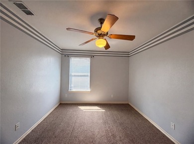 This Corpus Christi two-story home offers a patio, and a two-car - photo 12