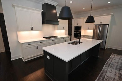 Better than new! Perfectly situated on a quiet cul-de-sac lot & - photo 11