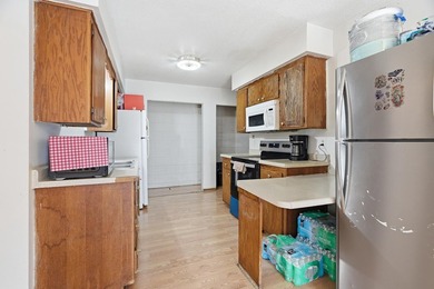 Nice twin home situated on a large corner lot, ideal for - photo 6
