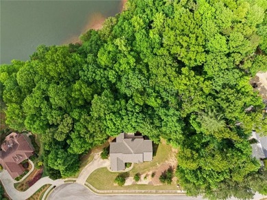BEAUTIFUL CUSTOM LAKE HOME! Experience peaceful lake living in - photo 36