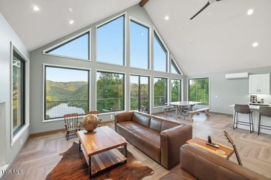 Perched above the crystal-clear waters of Watauga Lake, this - photo 2