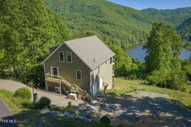 Perched above the crystal-clear waters of Watauga Lake, this - photo 3