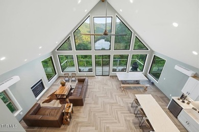 Perched above the crystal-clear waters of Watauga Lake, this - photo 8