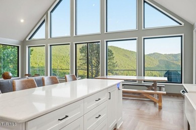 Perched above the crystal-clear waters of Watauga Lake, this - photo 9