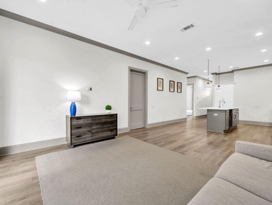Experience the perfect blend of luxury, location, and lifestyle - photo 11